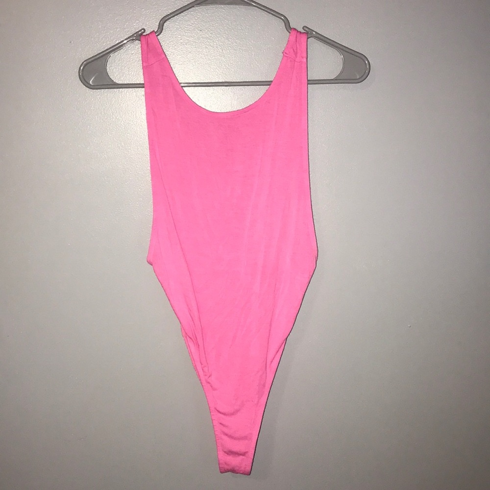 hot pink body suit